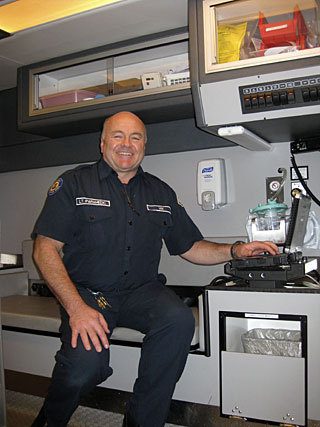Division Chief and Paramedic Mik Preyz at the computer