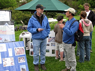 Phil Heikkinen (far left) of Sustainable Orcas Island sharing information during the fair.