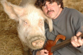 Dana Lyons and one of the residents of a farm animal sanctuary outside of Pittsburg Pennsylvania.