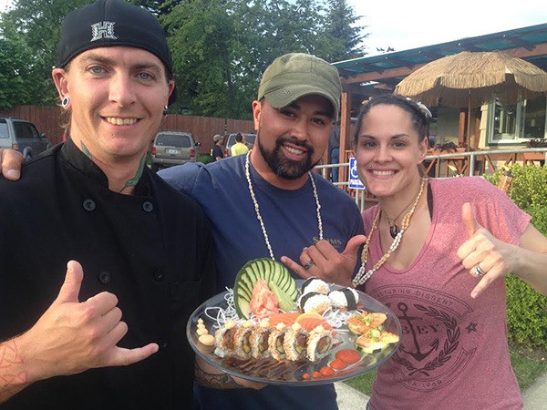 Chef Eli Baird with owners Kawika and Meagan McGuire.