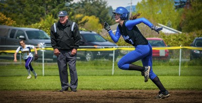 Viking Huxley Smart (3) stealing third base in the first game against Friday Harbor.