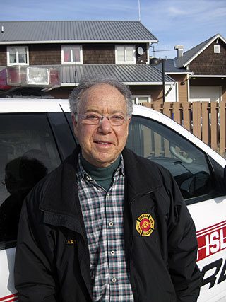 Harvey Olsan has served 18 years as a Fire Department Commissioner.
