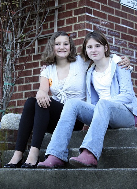 Colleen Smith Armstrong/ staff photo Orcas School students Caitlin Fowler and Joanne Mietzner grew their hair out for Locks of Love
