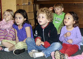 Kids at the Children’s House learning about music.