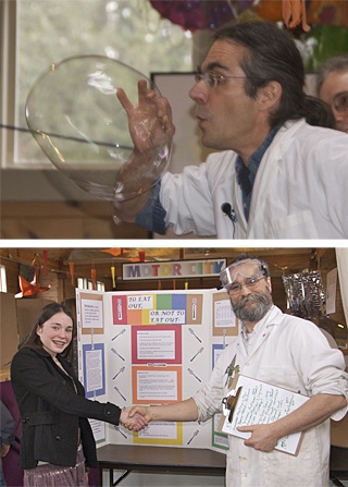 Funhouse board member David Densmore gets into the action of the Eighth Annual Science Fair held on March 28. Board member and “Head Wizard” Greg Books with Grace Thompson