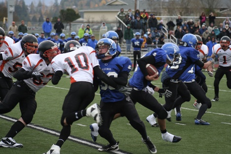 The Orcas Vikings tussle with the Napavine Tigers