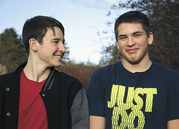 Cyrus Amour (left) was choking on a candy when Ryan Flint (right) performed the Heimlich maneuver.