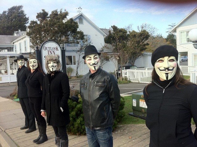 Guy Fawkes-masked folk in Eastsound.