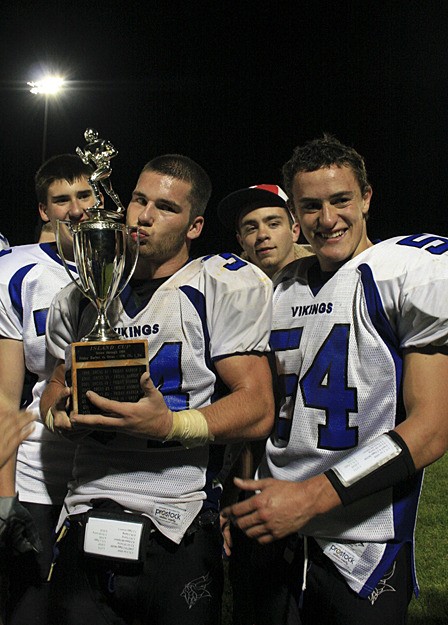 Viking Jacob Hansen kisses the Island Cup trophy.
