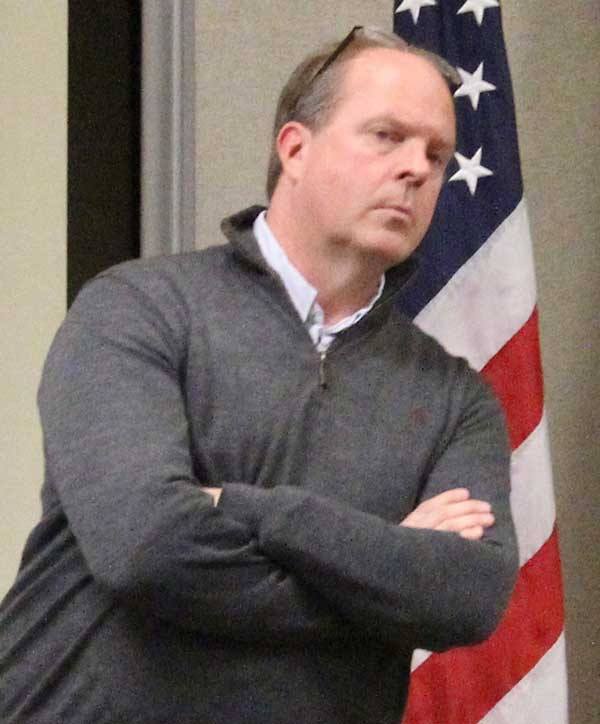 County council chairman Rick Hughes listens to questions during the town hall meeting on Dec. 10.