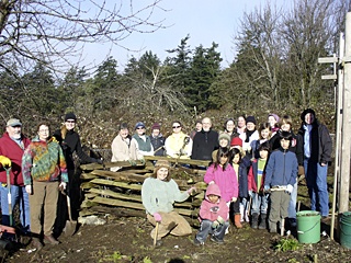 The group of volunteers helping clean up the grounds of Orcas School.