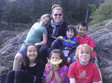 Rachel with some of the kids in after-school child care.