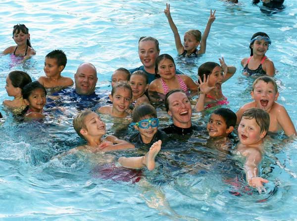 Above and left: Swim instructors from the YMCA program with Lorena’s Stankevich’s first and second grade class.