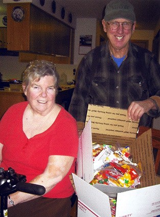 Judy and her husband and helpmate