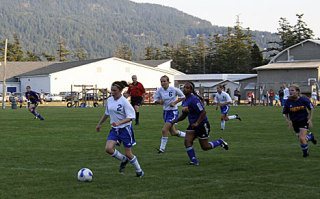Grace Thompson advances the ball to the Orcas goal