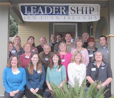 The 2014 LSJI class. Back row: A. Saxe; R. Parsins; G. Withers; D. Harsh; J. Parker; E. Derzay; T. Whalen. Middle Row: G. Graham; P. Long; P. Green; C. Gutierrez; J. Murphy; L. Williams; A. Eltinge.  Front Row: L. Taylor (co-director); H. Gladstone; L. Orton; J. Bolwinkle-Smith; T. Hayes. Missing from photo: K.  Pascuito.
