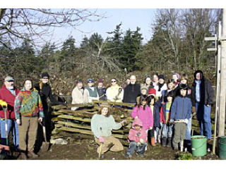 The group of volunteers helping to clean up the Orcas School grounds.