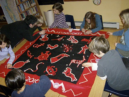 The students hard at work on their blanket.