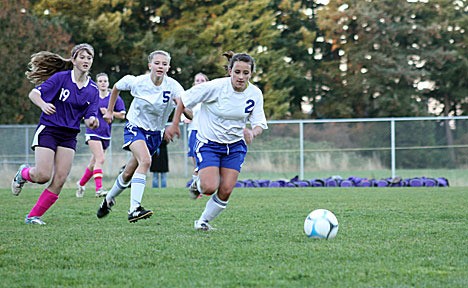 Susanne Mietzner leads the Viking charge to repel a Wolverine attack.