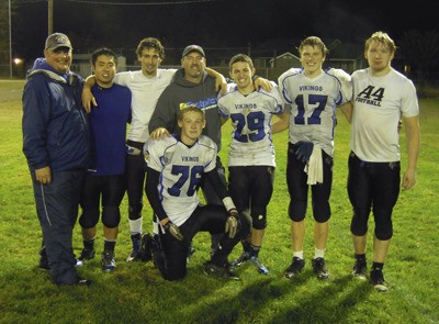 Coaches with the seniors. Coach Dale Briggs