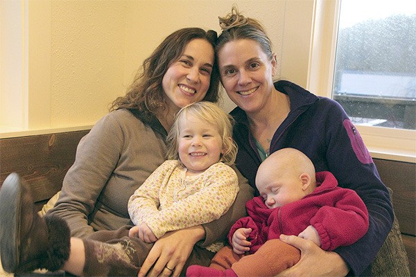 Orcas couple Katie (l) and Regina Zwilling with their children Grace and Paul.