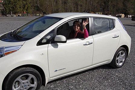 Assistant Energy Services Manager Anne Bertino driving the LEAF.