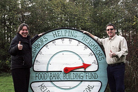 Colleen Smith Armstrong/ staff photo Orcas Island Community Foundation director Hilary Canty and Food Bank president Larry Shaw.