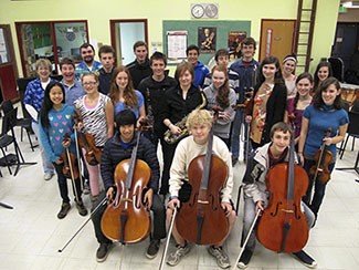 Orcas Youth Orchestra with conductors Pamela Wright and Darren Dix.