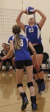 Maddie White (l) and Jess Nichols during the game against Lopez.