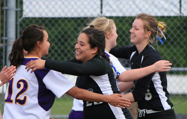 Wolverines and Vikings exchanged hugs after the game.