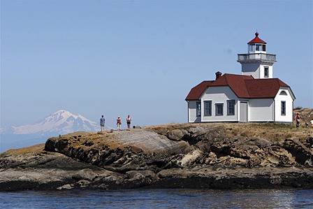 Patos Island Lighthouse with summer visitors.