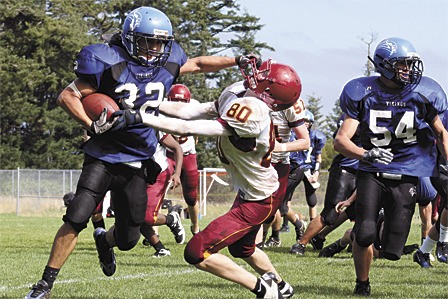 Michael Langworthy fends off a Lakeside Lion.