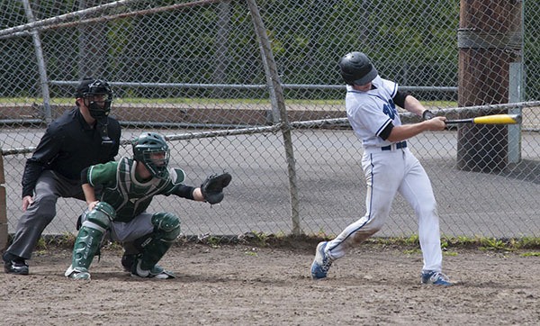 Kyle Masters hitting a home run against Shoreline.