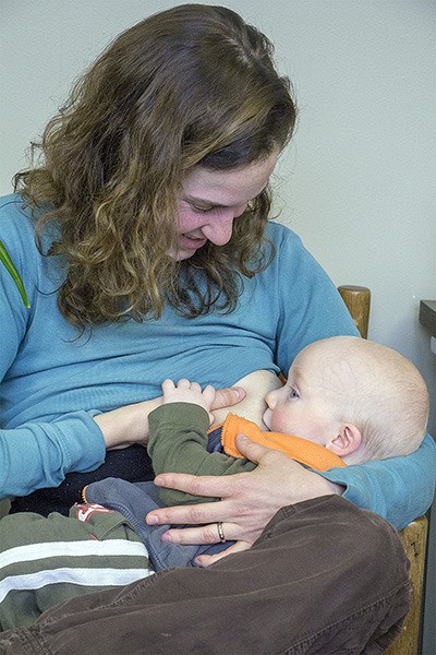 Katie Zwilling nursing her 9-month-old