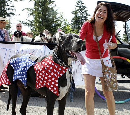 Dakota and his owner Lori Wix at the 2009 July 4th parade