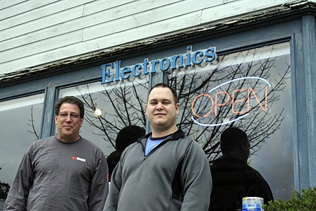 Owner Kyle Koepke and his employee Alex McDougall in front of the new store.