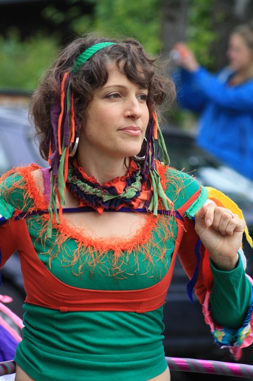 An islanders walks in the Solstice Parade.