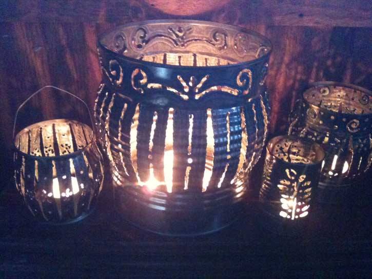 Upcycled tin can lanterns by Cari Darner.