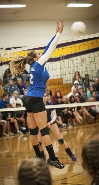 Mary Wilson blocking a Wolverine hit and scoring.