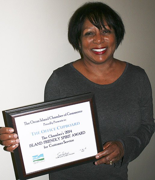Michell Marshall of the Office Cupboard with her island friendly spirit award.