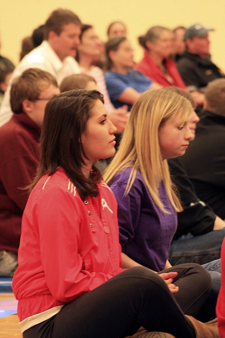 Students listening to the presentation on April 6.