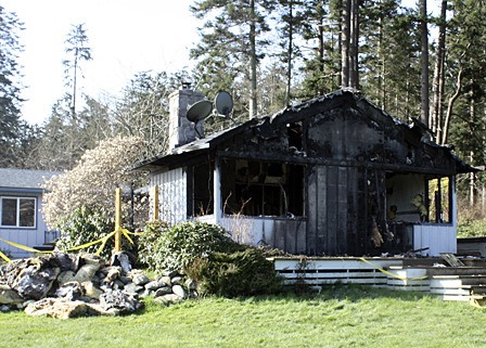 Police say the house on Scenic Lane is a 'total loss.'