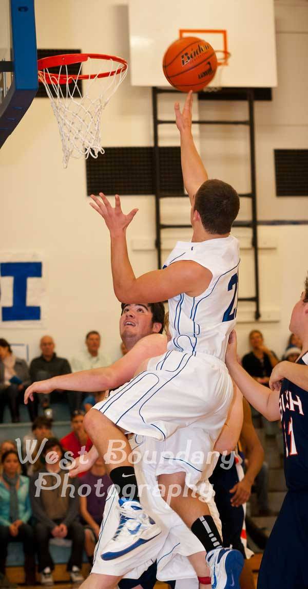 Viking Aubrey Schermerhorn drives for a layup.
