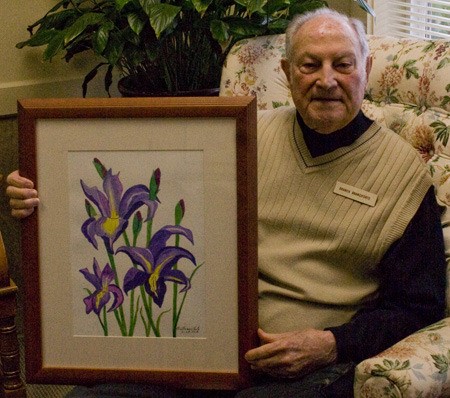Branch Branciforte with one of his watercolors.