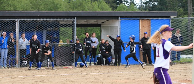 Teammates cheered Emily Bodenhamer on as she tied the game 5-5 with a home run.