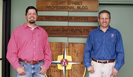 Andy Holman (left) and Mark Wagner have passed their land surveyor training.