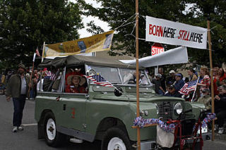 Jane Barfoot-Hodde rides shotgun in the Historical Society and Museum’s parade entry.