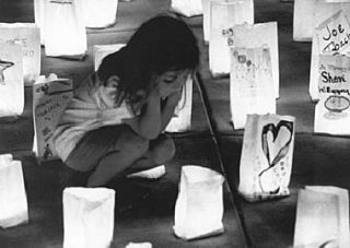Child at a Relay for Life Luminaria observance.