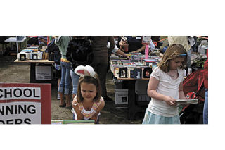 Making difficult decisions on what books to buy is part of the Library Fair for book lovers. Photo taken at 2007 fair.