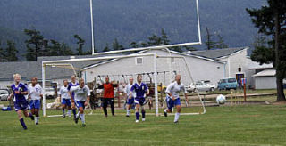 Orcas’ Lady Vikings challenge the Friday Harbor Wolverines for control of  the ball